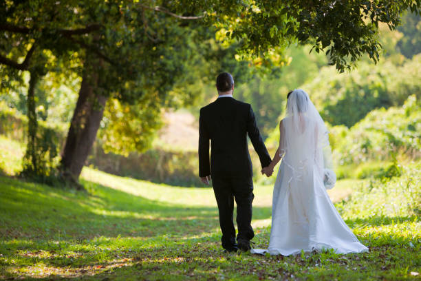 istock Bride and Groom in a Garden 157686097