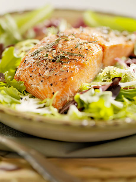 istock Salmon Filet on a Bed Of Fresh Salad 157686592