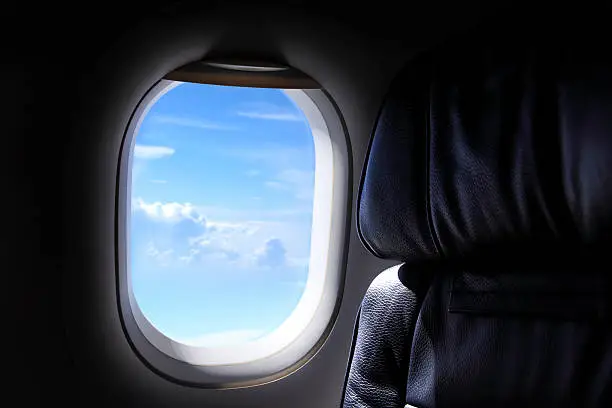 close up shot of airplane window. 