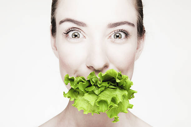 istock Woman with the lettuce 157686746