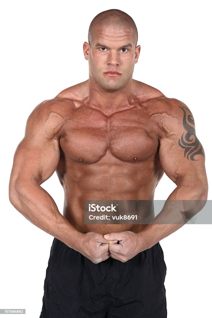 Bodybuilder posando - Foto de stock de Hombres libre de derechos