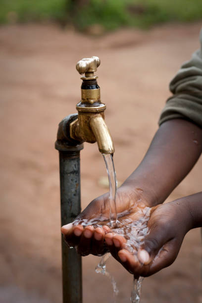 istock Hands of a african child under tab 157686887