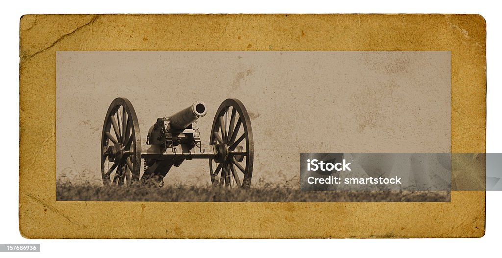 Civil War Cannon Photograph on Aged Carboard Frame Photograph of a civil war Cannon sitting on a hill in Chickamauga National Military Park, the first national military park in the USA, in Georgia. The cannon photograph is mounted on an old cardboard mount that has become yellowed and stained by age. Union Army Stock Photo