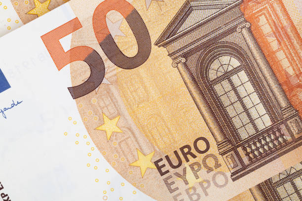 euro banknote money (eur) - legal tender of the european union - european union euro note european union currency paper currency currency imagens e fotografias de stock