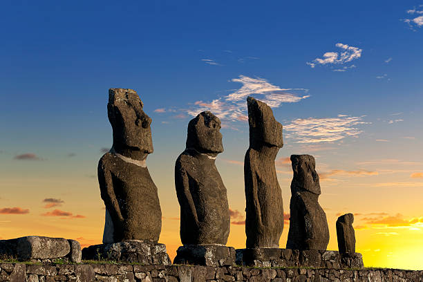 Easter Island Chile dawn over Moais at Ahu Tahai stock photo