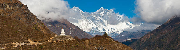 istock Mt Everest overlooking colorful prayer flags white stupa Himalayas Nepal 157691940