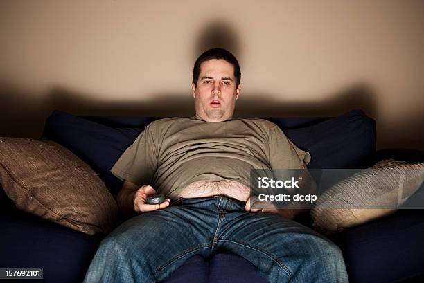 Overweight Slob Watching Tv Stock Photo - Download Image Now - Laziness, Couch Potato, Men