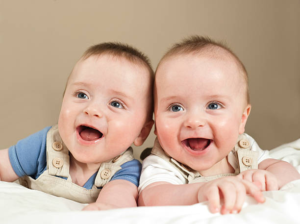 istock Smiling happy identical twin boys 157692485
