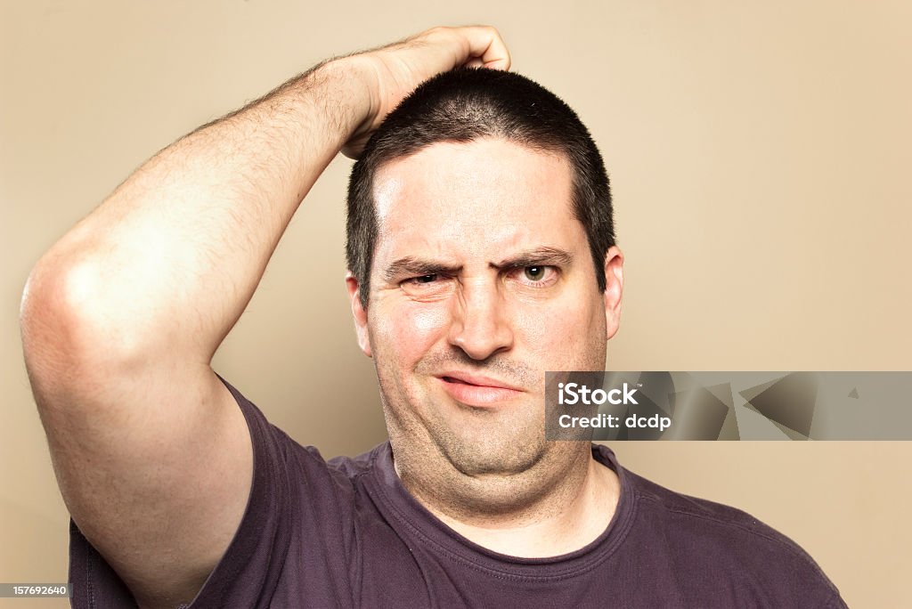 Man is confused  Overweight Stock Photo