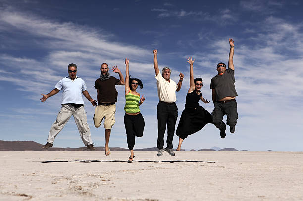 istock Jumping happy people 157692657