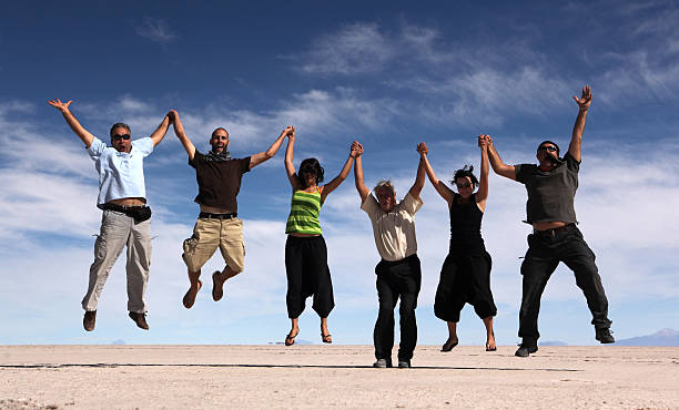 istock Jumping happy people 157692751