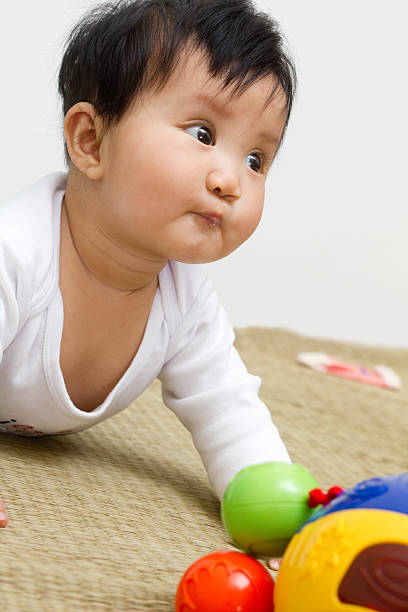 istock Baby playing toy 157693141