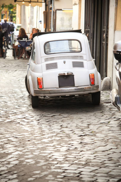istock Tiny vintage car in an alley, Rome Italy 157693797