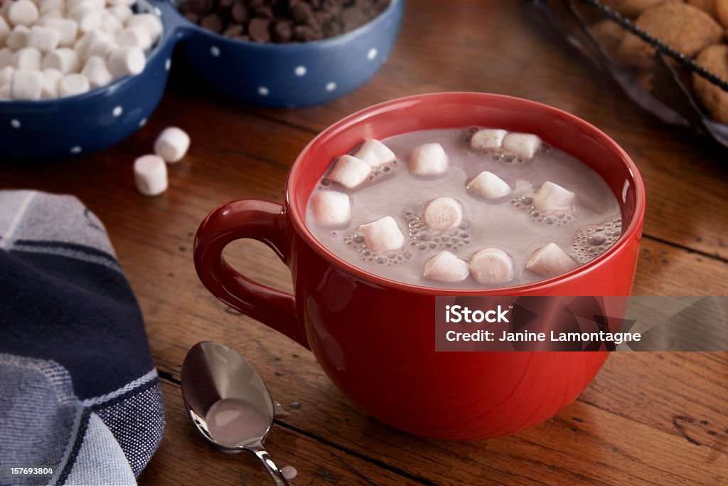 Mug of Hot Chocolate and Marshmallows A steamy hot cup of hot chocolate with marshmallows. Hot Chocolate Stock Photo