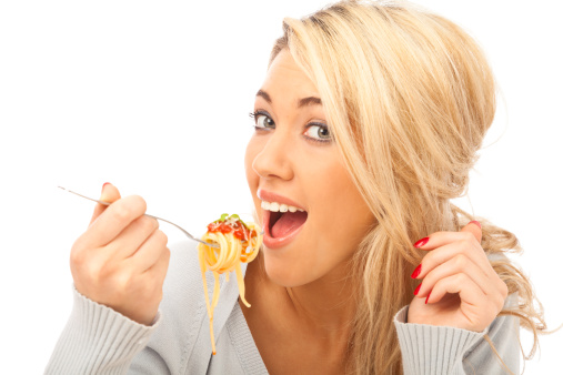 Happy Young  Woman Eating the Pie Slice with the Big Pleasure. White background.