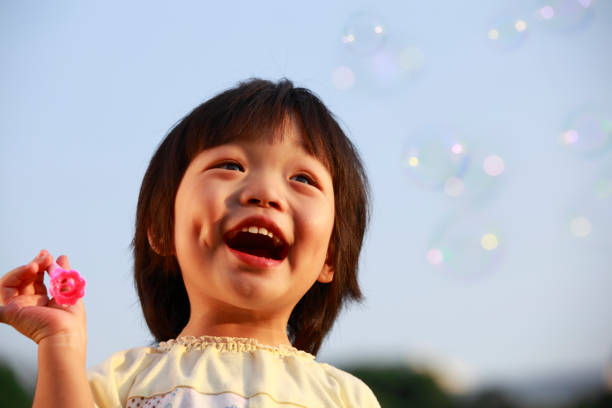 istock Little girl and happy Bubbles 157694238