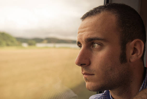 istock Business Man Traveling by Train looking award 157694378