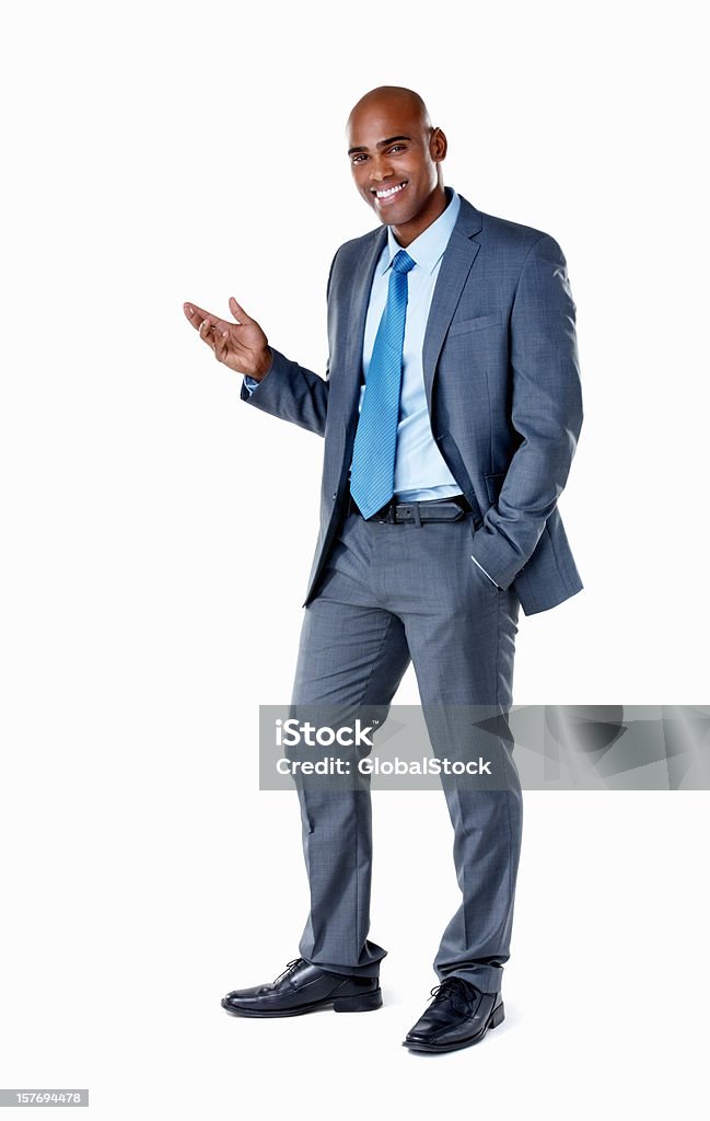 Sorridente homem de negócios, mostrando um produto-copyspace invisível - Foto de stock de Homem de negócios royalty-free