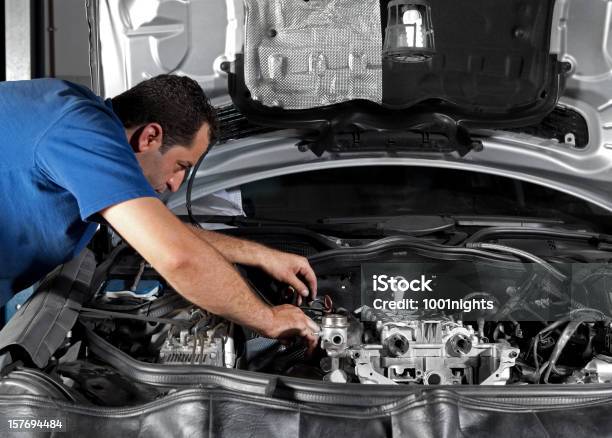 Auto Repair Shop Stock Photo - Download Image Now - Adult, Auto Mechanic, Auto Repair Shop