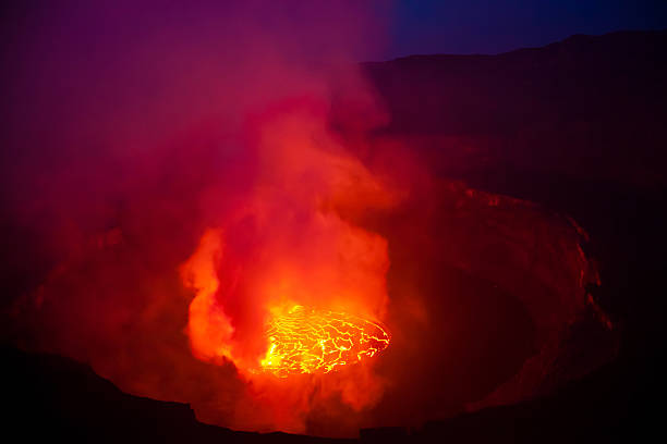 istock Volcano crater with boiling lava lake 157694590