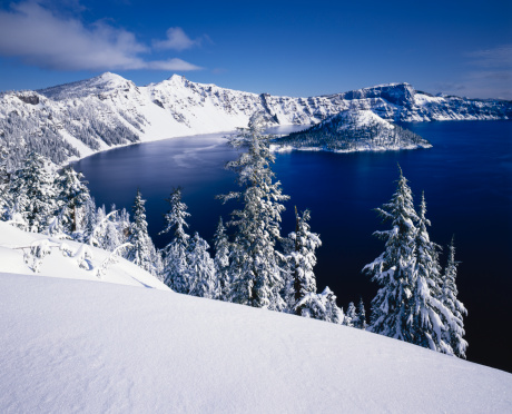 Fresh Snow Glistens On The Rim Of Crater Lake National Park, Oregon