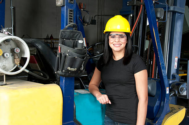 Hispanic Female Manufacturing Worker stock photo