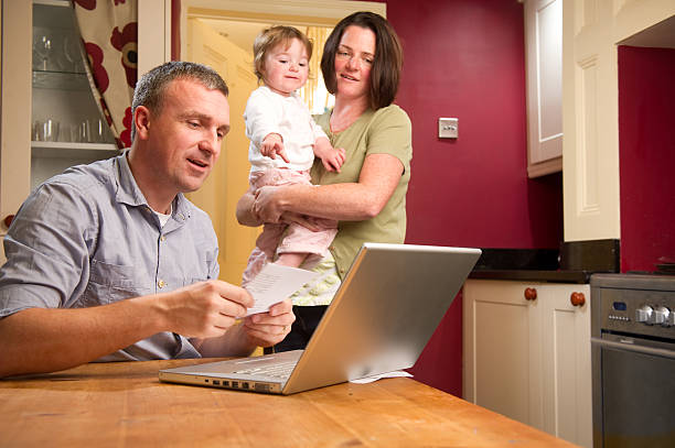istock Family Around a Laptop 157694887