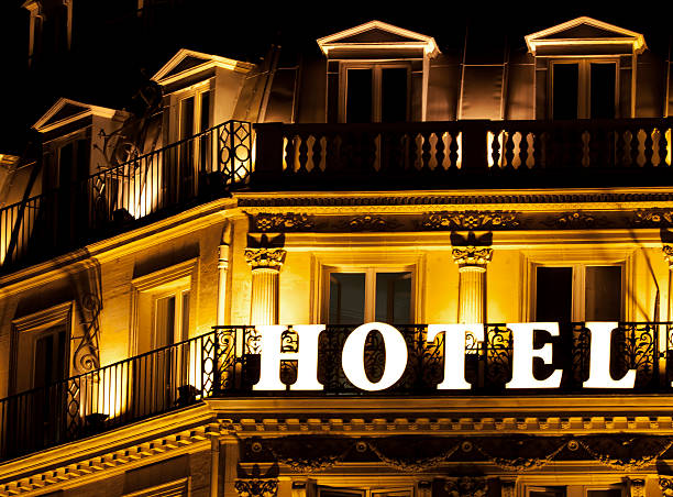 Brightly lit HOTEL sign on a hotel balcony stock photo