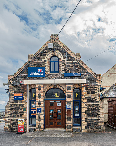 Portpatrick,. Scotland, UK - 5th July 2023: Front of the RNLI lifeboat station in the seaside village of Portpatrick, Dumfries and Galloway. A lifeboat station was established in Portpatrick in 1877.