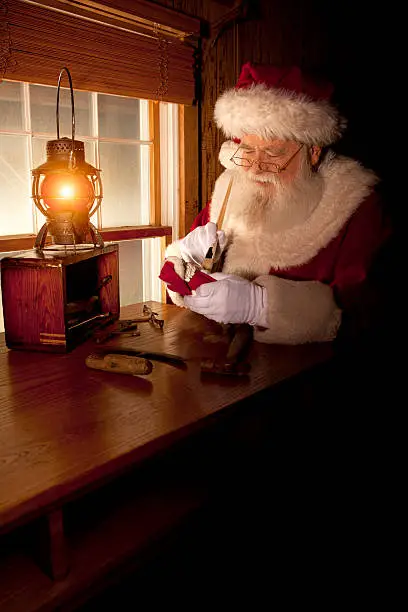 Pictures of Real Santa Claus working in his shop