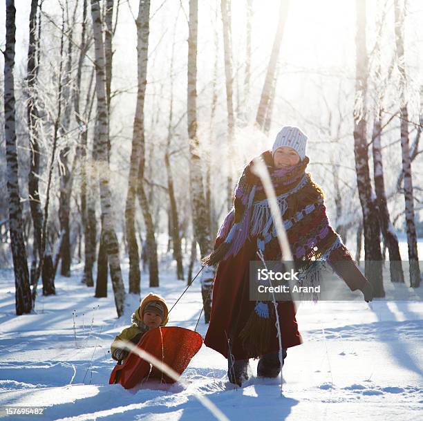 Family Having Fun In Winter Stock Photo - Download Image Now - Activity, Adult, Baby - Human Age