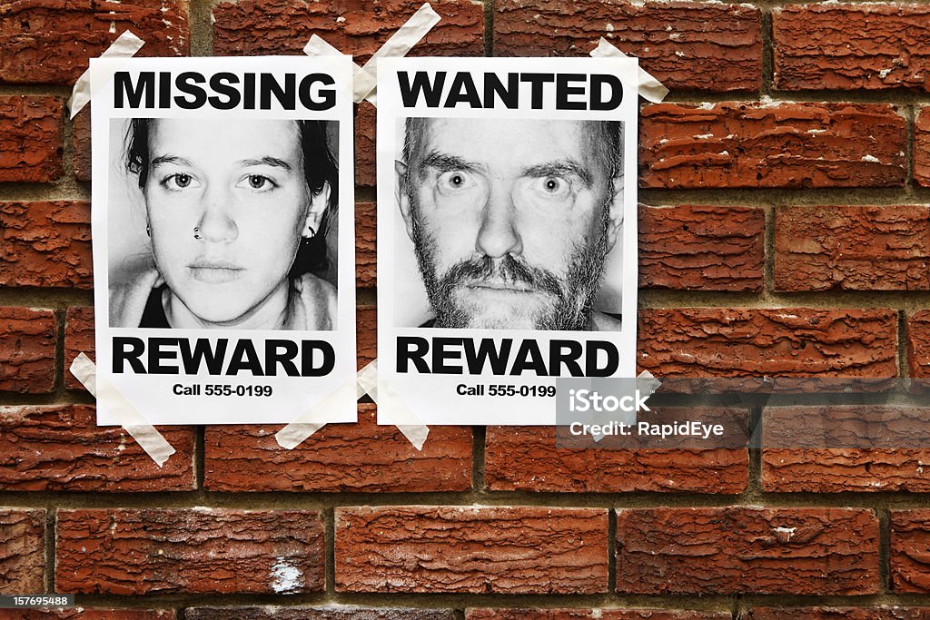 Missing and Wanted posters taped to brick wall  Wanted Poster Stock Photo