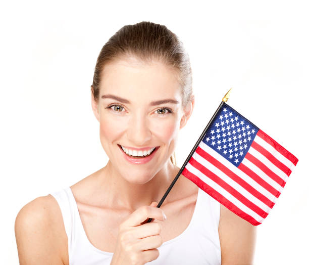 istock Smiling young woman with American flag 157695686