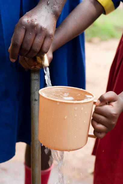 istock African children with cup of water 157695797