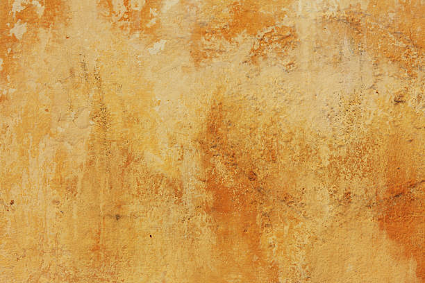vecchio muro giallo texture di fes, marocco - affresco foto e immagini stock