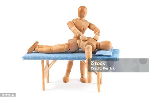 Wooden Mannequin Gives A Massage Relaxing Time Stock Photo - Download Image Now - Massaging, Bizarre, Artist's Figure