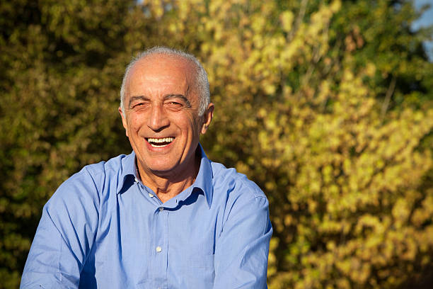 istock Smiling happy senior at park 157696237