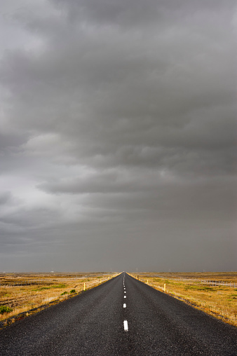 highway on iceland, dark dramatic sky