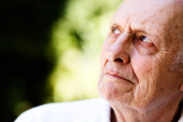 istock Handsome old man looks to side, frowning 157696385