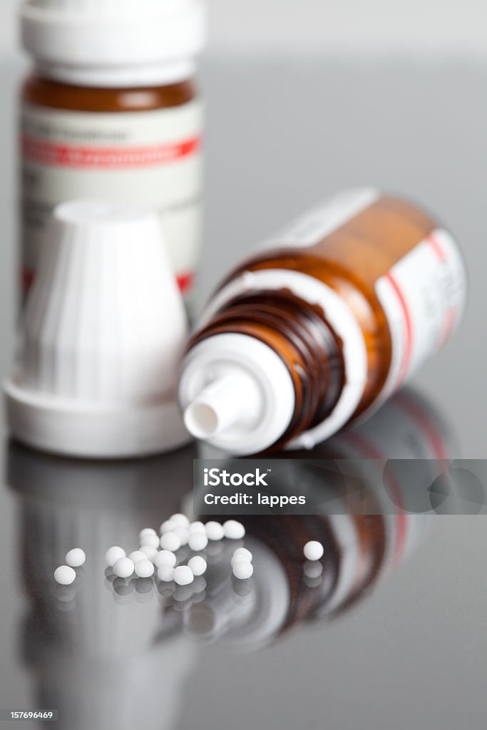 Macro de homeopáticos pastillas - Foto de stock de Homeopatía libre de derechos