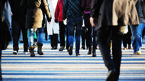 istock Pedestrians crossing street 157696663
