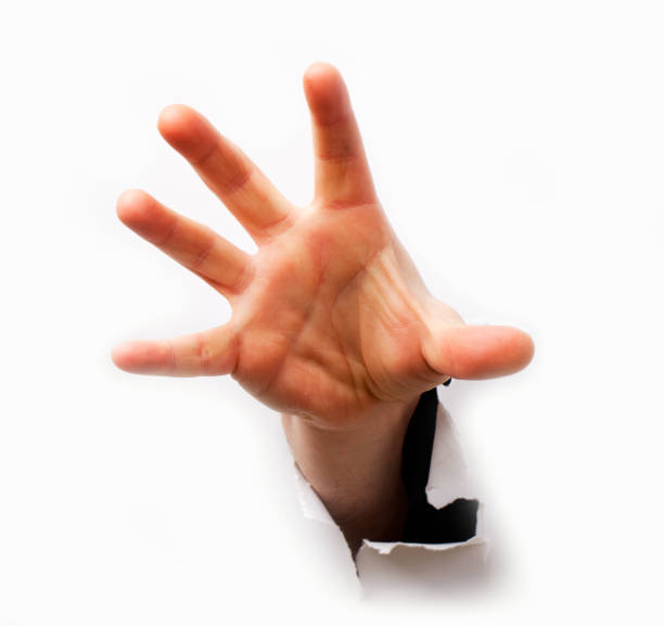 istock Human hand with opened fingers from hole in white background 157696688