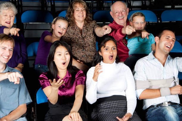 istock Diverse large group of people watching an exciting game 157697218