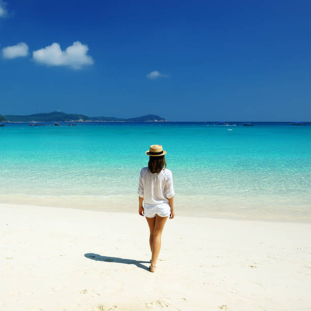 istock Woman at beach 157700102