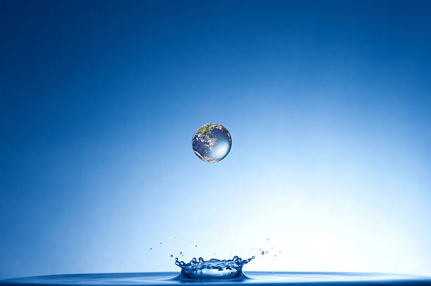 earth falling into water earth falling into water water conservation photos stock pictures, royalty-free photos & images