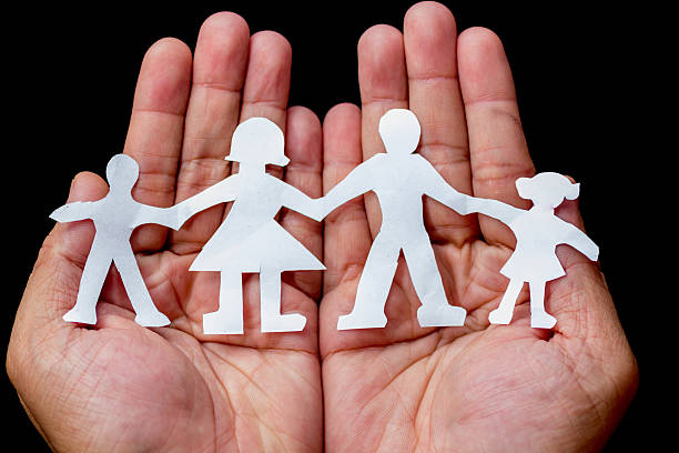 istock Paper family in a hand 157703598