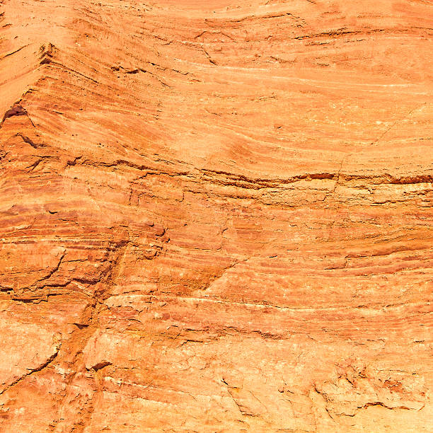 istock Red rock background texture pattern from Ocres du Roussillon, France. 157704985