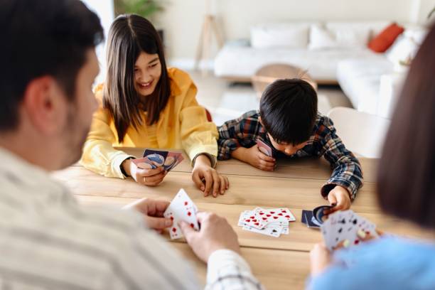 istock Beautiful family playing cards 1577053612