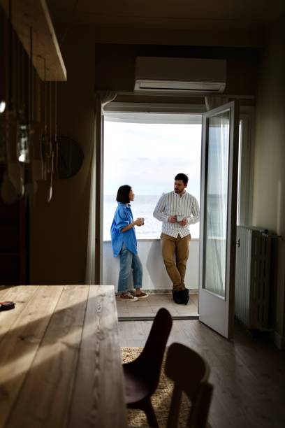 istock Beautiful couple enjoying on the balcony 1577057958