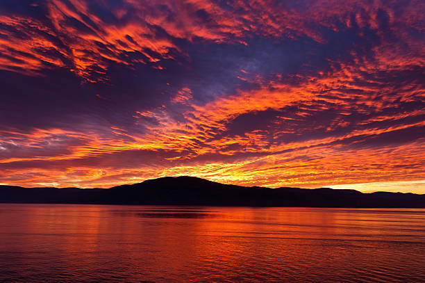 istock Amazing fiery burning evening sky 157713956